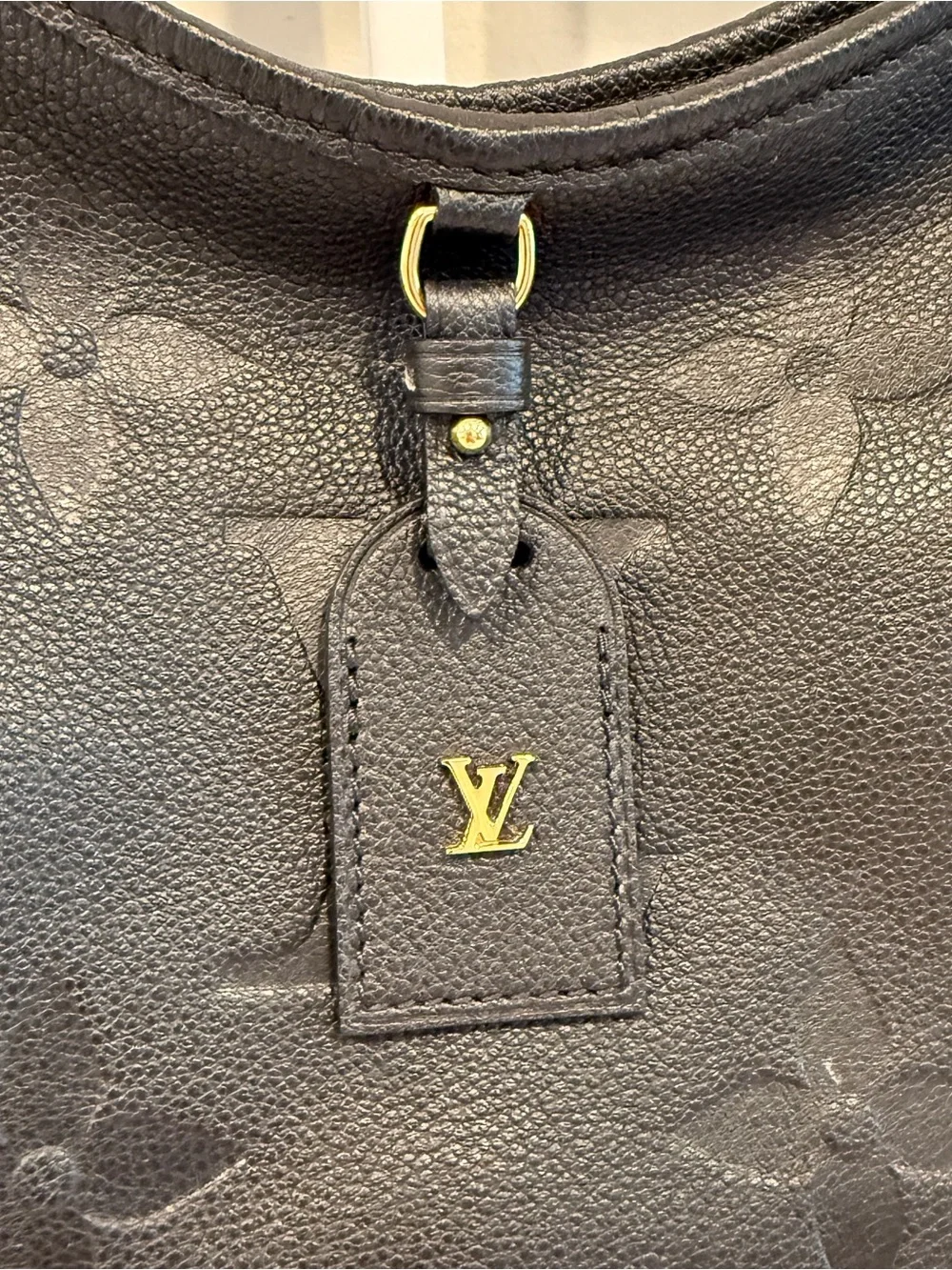 Louis Vuitton CarryAll PM Monogram Empreinte Leather Black- retails $3450